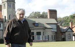 President Jose Mujica up beat on the economy, not so much on politics 