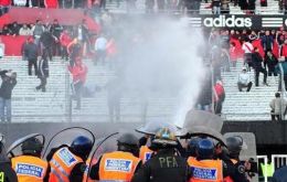 Inside the stadium firemen sprayed rioters with water while outside fans went on a rampage