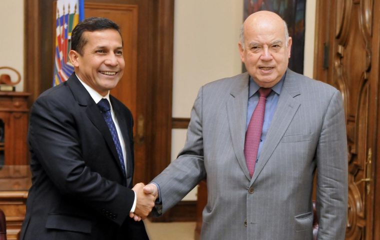 President-elect Humala greeted by OAS head Jose Miguel Insulza 