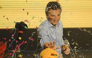 Macri celebrating with his running mate at party headquarters 