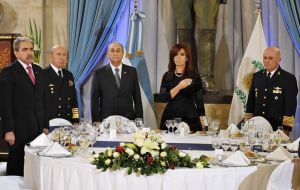 The Argentine president toasting with generals and admirals at the Armed Forces annual dinner