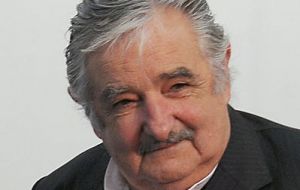 President Mujica says those outlays not considered necessary will be the first to go