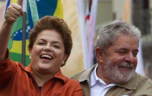 The two leaders celebrate at a political rally the success of the Workers Party