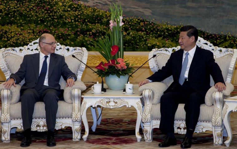 Chinese Vice-President Xi Jinping meets Argentine minister Timerman (L) in Beijing 