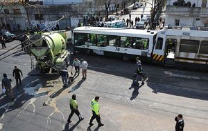 Aerial view of the accident, the bus squashed by the urban train 