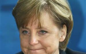 German Chancellor Angela Merkel counting to the last vote
