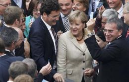 Chancellor Merkel coalition celebrates, but several hurdles still ahead  (Photo Reuters)