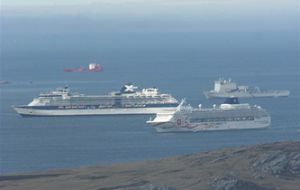 Peaceful Stanley in a busy cruise day, miles away from Arguello’s fantasy Malvinas Islands (Photo by Donald Morrison)