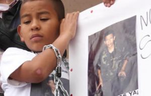 The 13 year old boy who will never see his father, Sergeant Jose Libio Martínez 