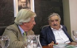 Mujica (R) and Astori seem to have conflicting views on economic policy and it is surfacing    