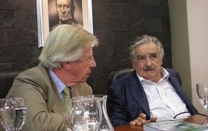 Mujica (R) and Astori seem to have conflicting views on economic policy and it is surfacing    