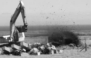 Armoured mechanical flail exploding live ordnance in Falklands mine fields