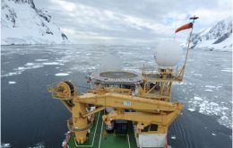 HMS Protector's journey through the Lemaire Channel, situated along the Antarctic Peninsula, where the ship broke through ice for the first time 