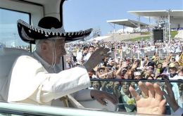 To the delight of the crowd, the Pope donned a black-and-white sombrero
