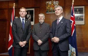 Minister Browne next to MLA Gavin Short and Falklands’ Governor Nigel Haywood (Photo: Reuters)