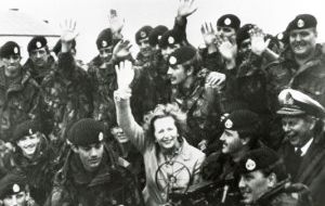 Margaret Thatcher in 1983 surrounded by members of the Task Force