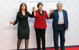 The three full members in the family picture: Cristina, Dilma and Mujica 