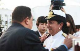 Admiral Maniglia is congratulated by President Chavez 