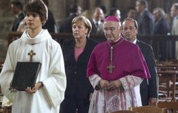 Merkel and Hollande at the Reims cathedral celebrate the 50th anniversary of the historic event 
