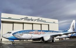 Alaska Airlines reveals its fish-patterned Boeing 737-800 (N559AS) dubbed “Salmon-Thirty-Salmon II.” (Photo by Alaska Airlines)