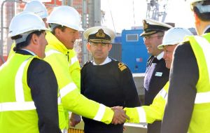 PM David Cameron, escorted by Archie Bethel, CEO Babcock Marine and Technology Division, is introduced to Captain Simon Petitt, Commanding Officer of HMS Queen Elizabeth. (Photo: MoD)