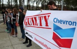 Texaco, purchased by Chevron is accused of placing drilling waste in unlined pits, causing contamination of the area and illness amongst local tribes