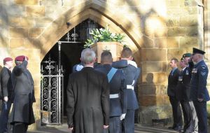  Veterans and serving personnel salute the coffin of Sir Rex Hunt as it is borne into the church (Pic: I McIntyre)