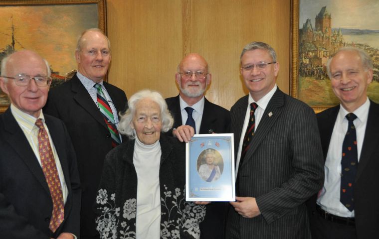 Andrew Rosindell MP with members of the FIA Executive Committee and the portrait of Her Majesty which he has presented to FIA 