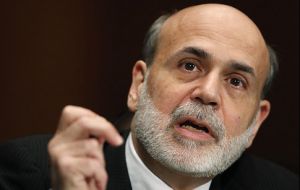 Bernanke said rates will remain exceptionally low “until at least through mid-2015”