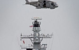 HMS Sutherland and a Merlin helicopter make a routine maritime security patrol (Photo: MoD)