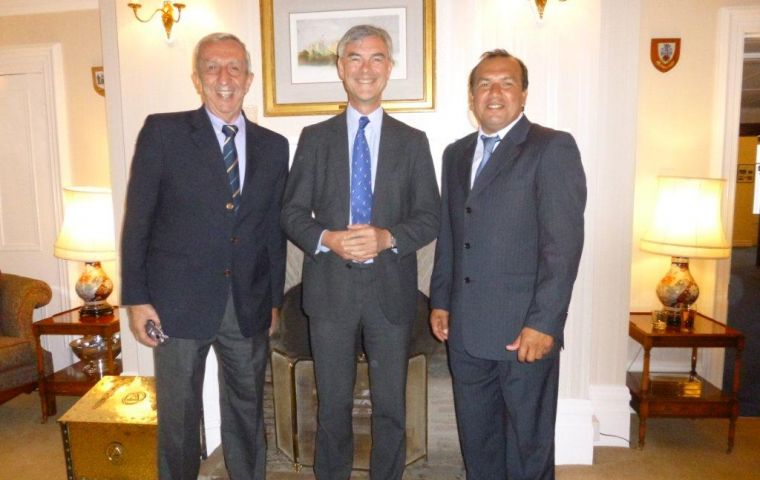 Toto da Silveira, Governor Nigel Haywood and Ruben Sosa at Government House reception 