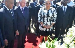 President Michel Martelly and former president Clinton as the sombre ceremony 