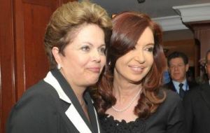 With her Brazilian peer Dilma Rousseff 