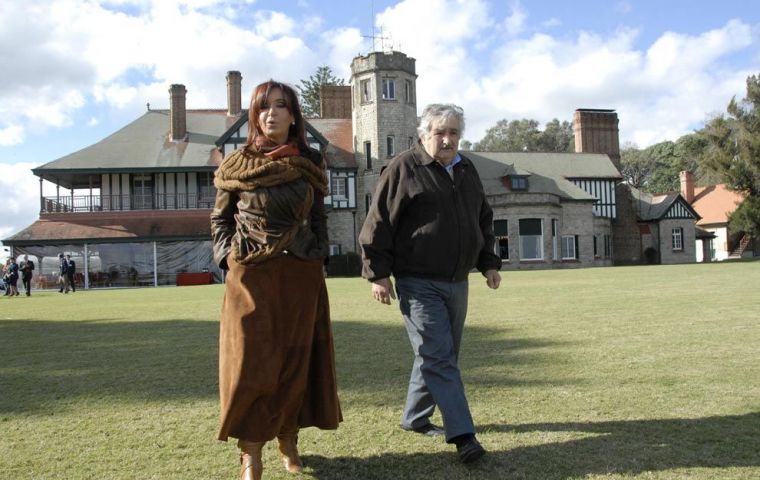 Mujica and Cristina share a relaxed moment in their tumultuous relation 