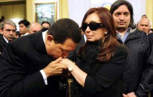 Chavez was next to Cristina Fernandez when she lost her husband former president Nestor Kirchner 