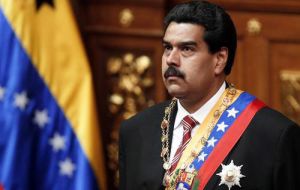 The acting president with the sash; despite protests from the opposition he is the official candidate for the coming elections  