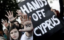 Cypriots protest in the streets of Nicosia against conditions of the bail out