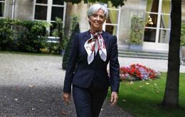 Ms Lagarde apartment was searched by French police in a case involving businessman Tapie