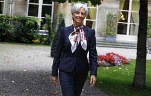 Ms Lagarde apartment was searched by French police in a case involving businessman Tapie