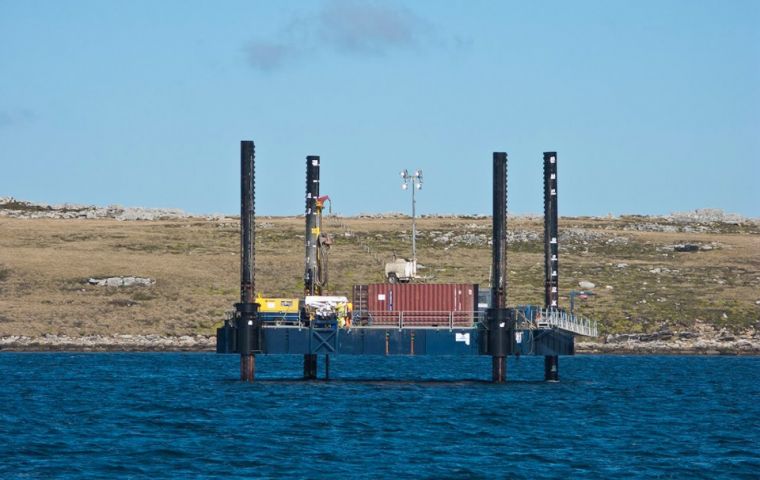 The jack-up barge and deck-mounted core drill machine on location in Port William (Photo courtesy by C. Harris)