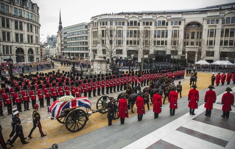 A gun carriage drawn by six black horses carried the coffin through the streets to St Paul's