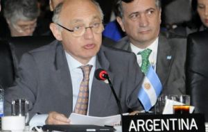 Timerman addressing the OAS assembly in Antigua