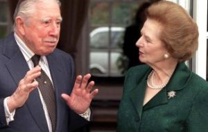The famous picture of Thatcher when she visited Pinochet at his house arrest in England 