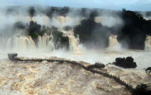 Catwalks and sight posts over the falls covered in water 