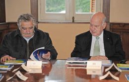 The Uruguayan president with OAS Secretary General Insulza 