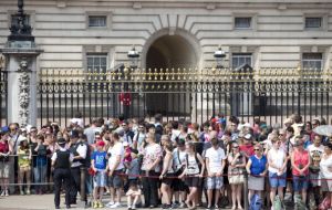 Crowds celebrate the arrival of the newest heir to the British throne 