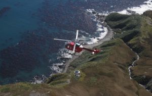 Team Rat helicopters waiting to load pellet bait to spread along the island (Photo: Roland Gockel/SGHT)