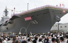 The huge Japanese flat-top destroyer, Izumo, has a flight deck nearly 250m long and can reportedly carry more than nine helicopters