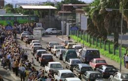 Long queues at the border and threats of further Spanish measures escalated the dispute 