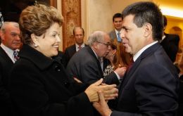 Cartes receives Brazilian president Dilma Rousseff (L) at his residence Wednesday evening 